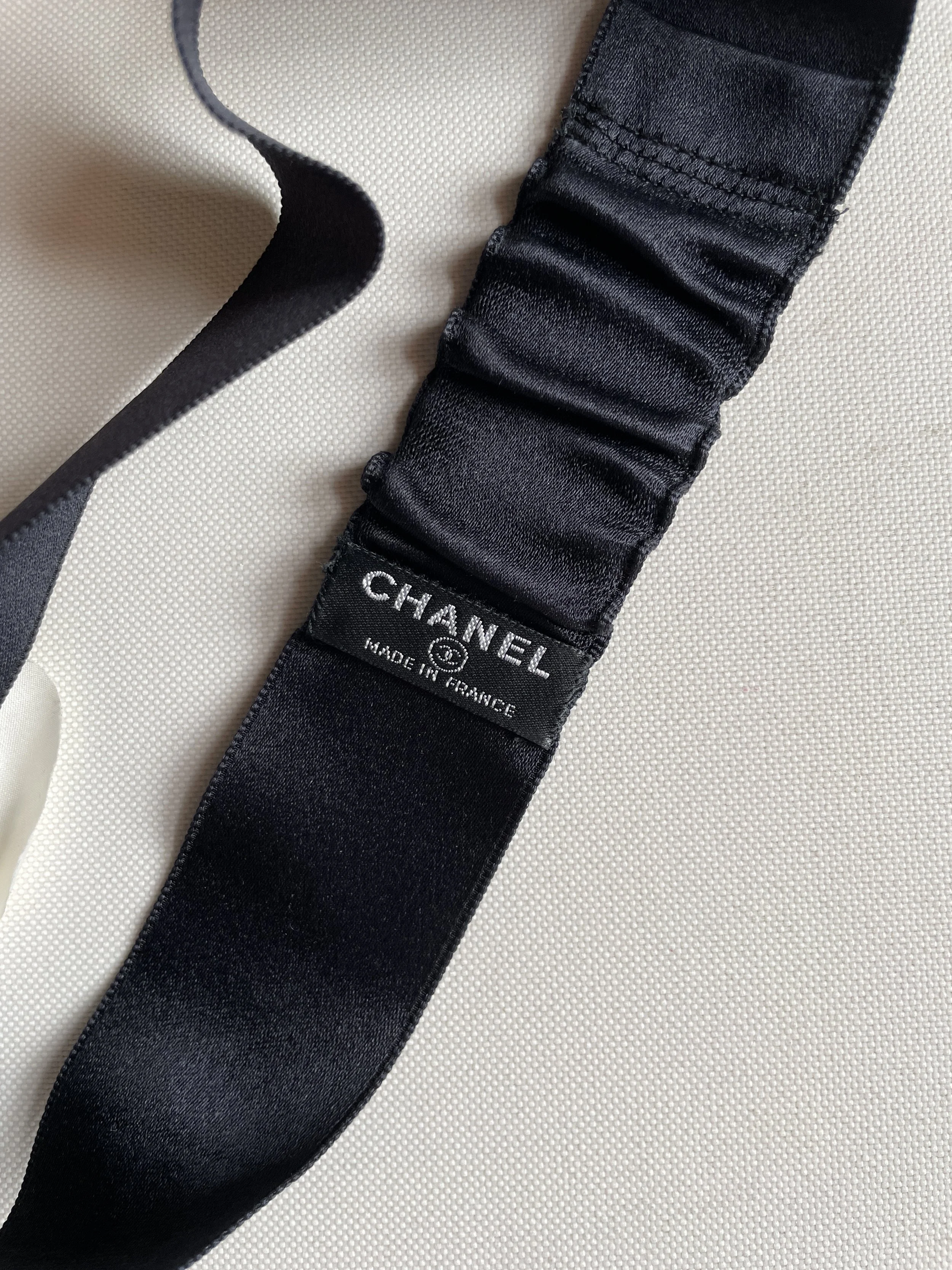 CHANEL Black and White Satin Logo Headband Chanel Black Satin White Camellia Headband — Mia Luxury Vintage main image 2