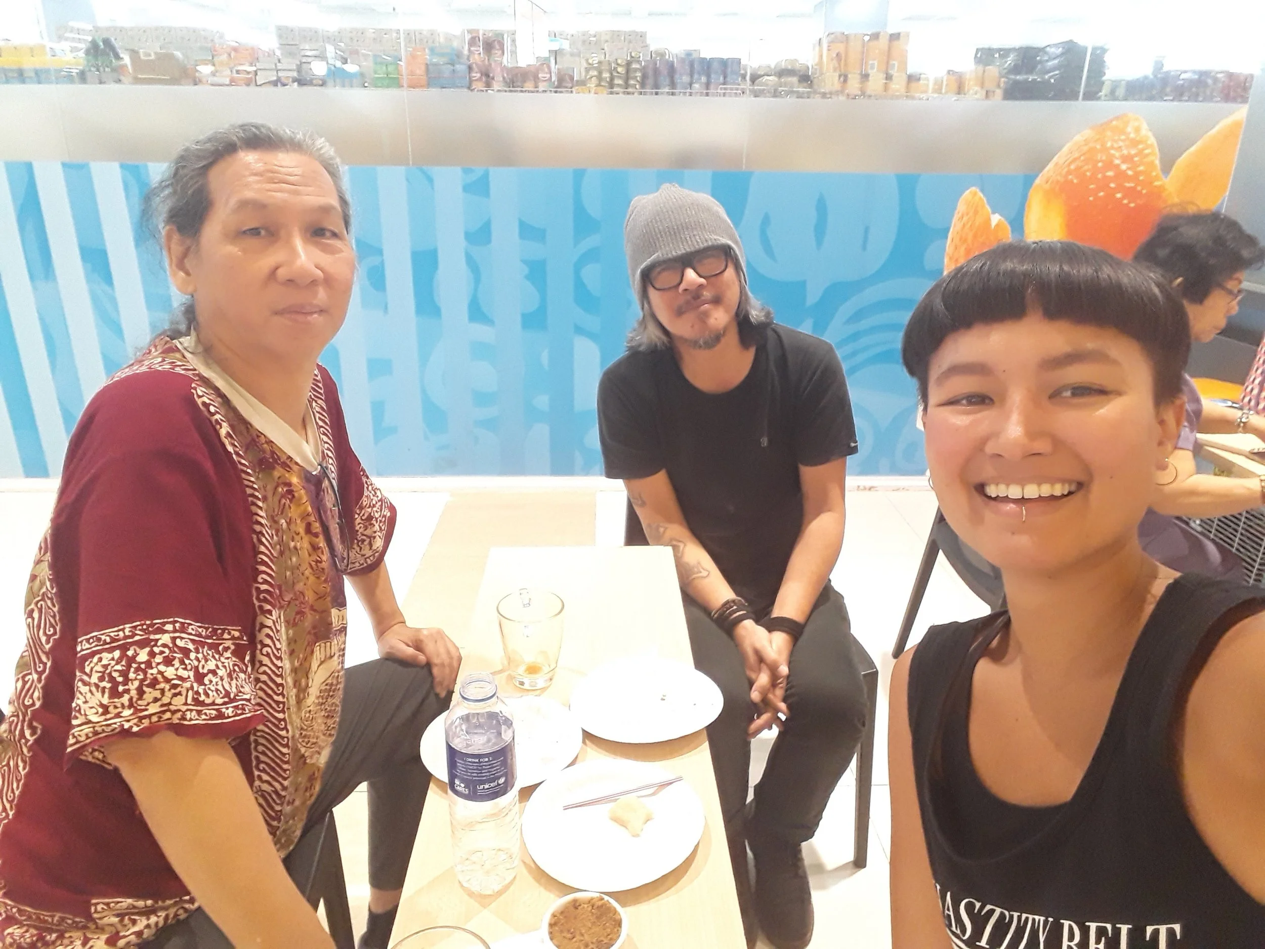 Curator Anna meeting and chatting current state of Phil cinema with NCCA cinema chair Teddy Co and director Lav Diaz. Manila, 2019.
