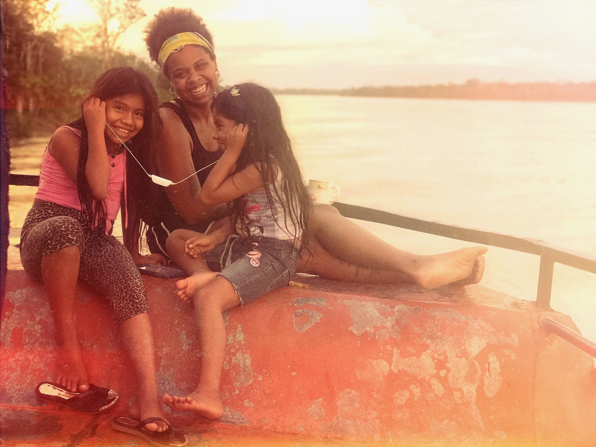 Jordan and the two adorable girls she made friends with on the boat