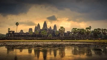 Raise A Glass To Angkor Wat Drink in hand, watch the golden glow of a sun rise over the temples of Angkor Wat.