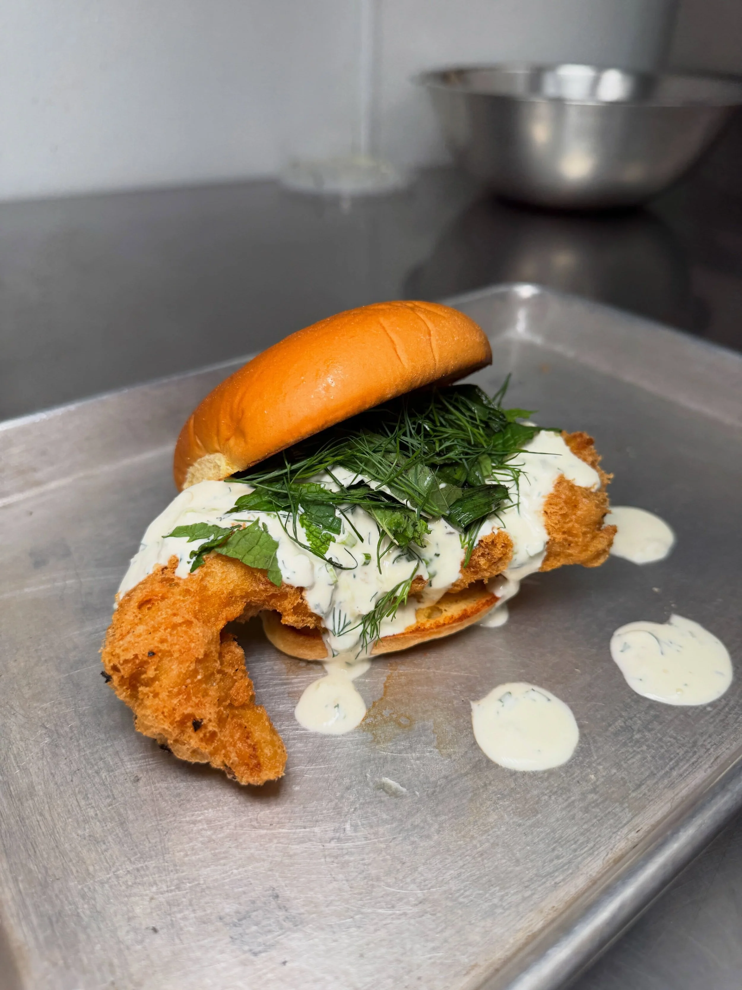 It always starts with a text&hellip;.

Chả C&aacute; L&atilde; Vọng fish sandwich inspired by the Vietnamese dish of the same name. 

Traditionally an iconic Hanoi dish made with turmeric-marinated white fish, pan-fried tableside with plenty of fresh