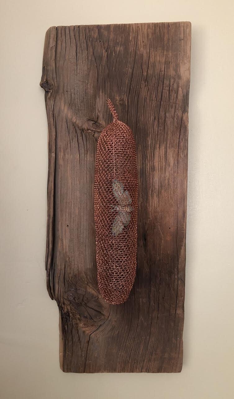  Laura Boner- Cocoon Quietus  copper, bronze, sterling silver, barn wood  22 x 9.25 x 3.75  $300  laurabeestudios@gmail.com 