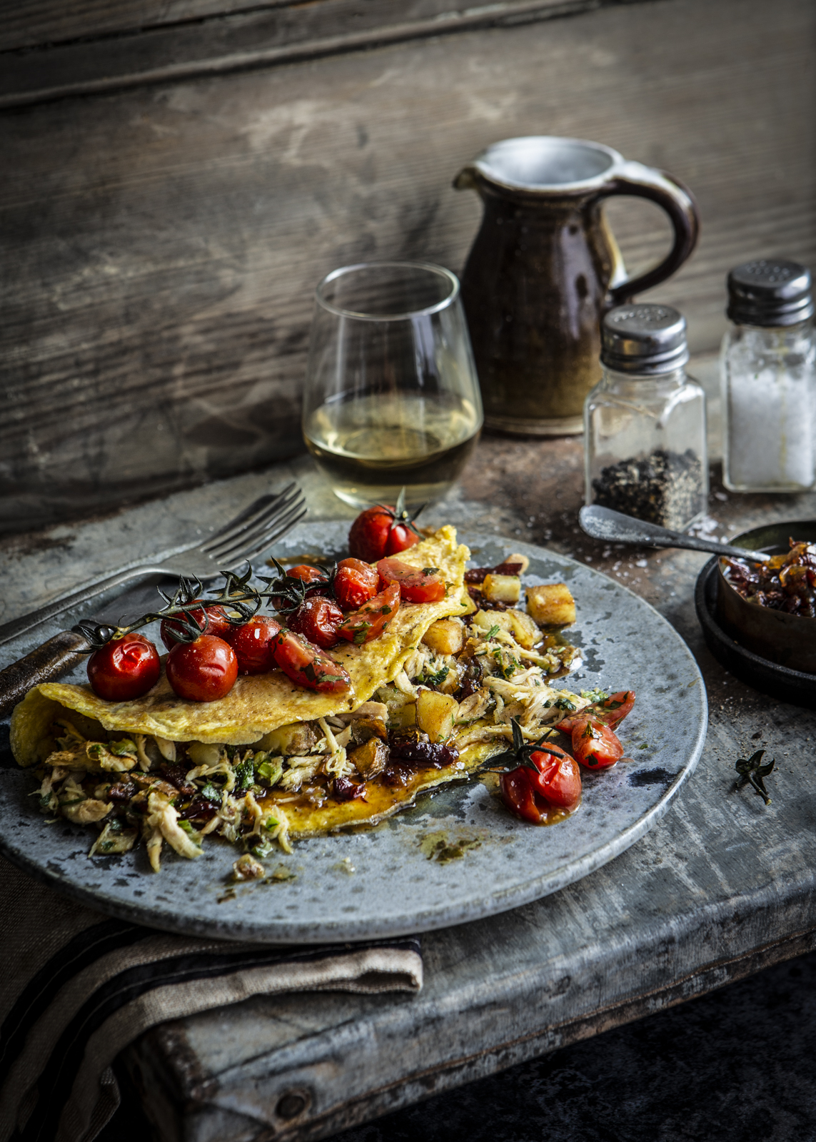 Pancake with tomatoes on a plate