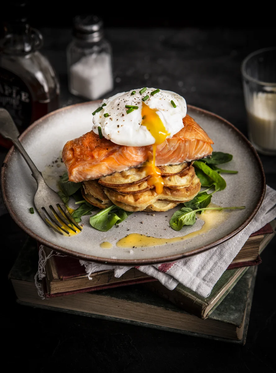 Salmon with poached egg on a plate