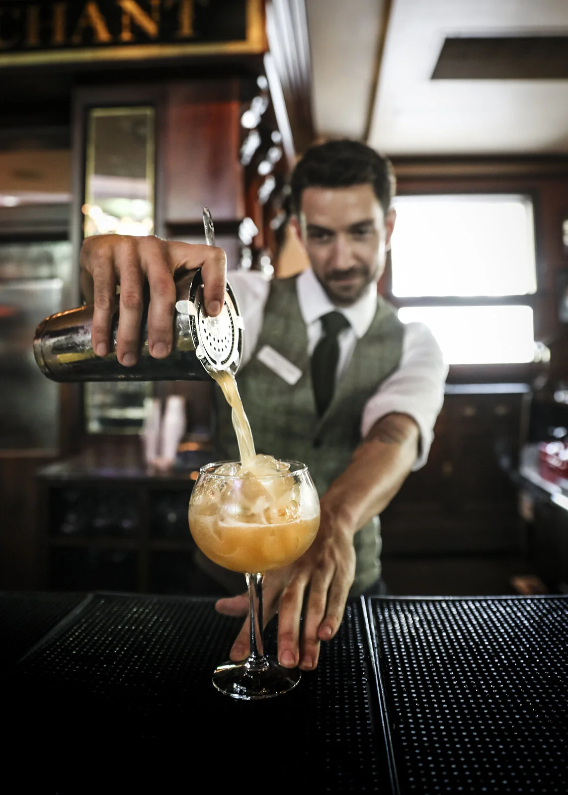 Photo of barman pouring a cocktail - Bar Packages