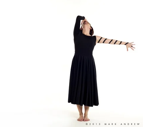 isa looking up hand on wall kaddish.jpg
