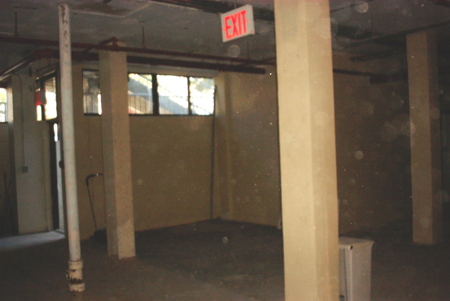 Before renovations: columns and piping in the way