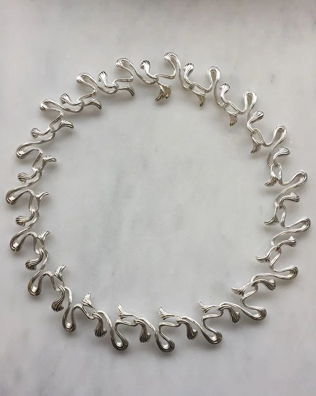 Linkage
Hand carved blue wax, molded and replicated