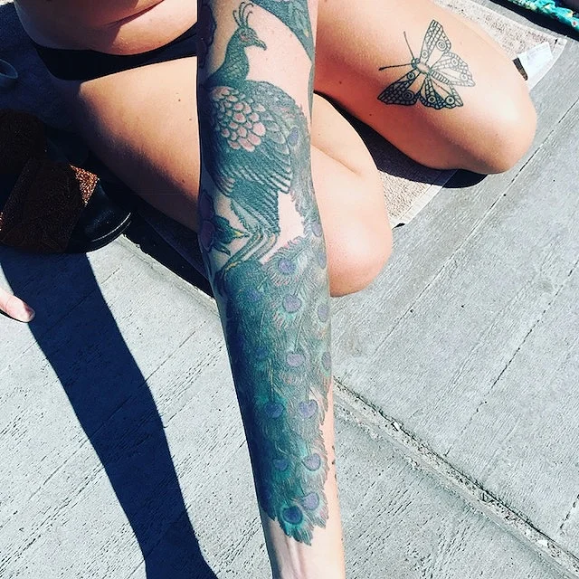 PEACOOK TATOO