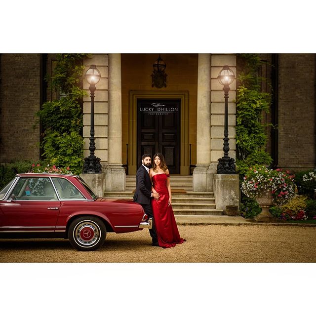 Minisha &amp; Ranvir framed beauitfully within the pillars of the entrance to Hedsor House.

#luckydhillonphotography

www.luckydhillon.com