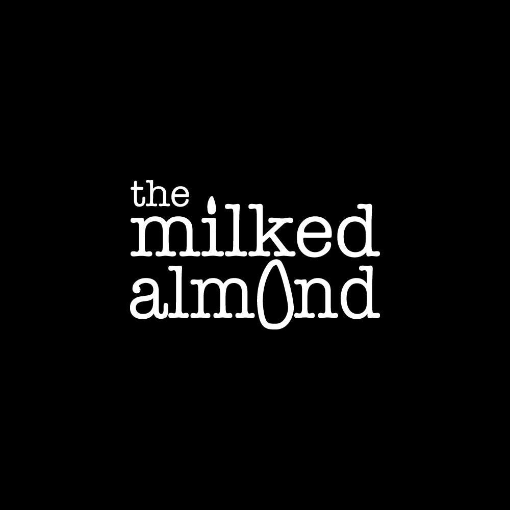 TheMilkedAlmondLogo_WHITEon Black SQuare.jpg