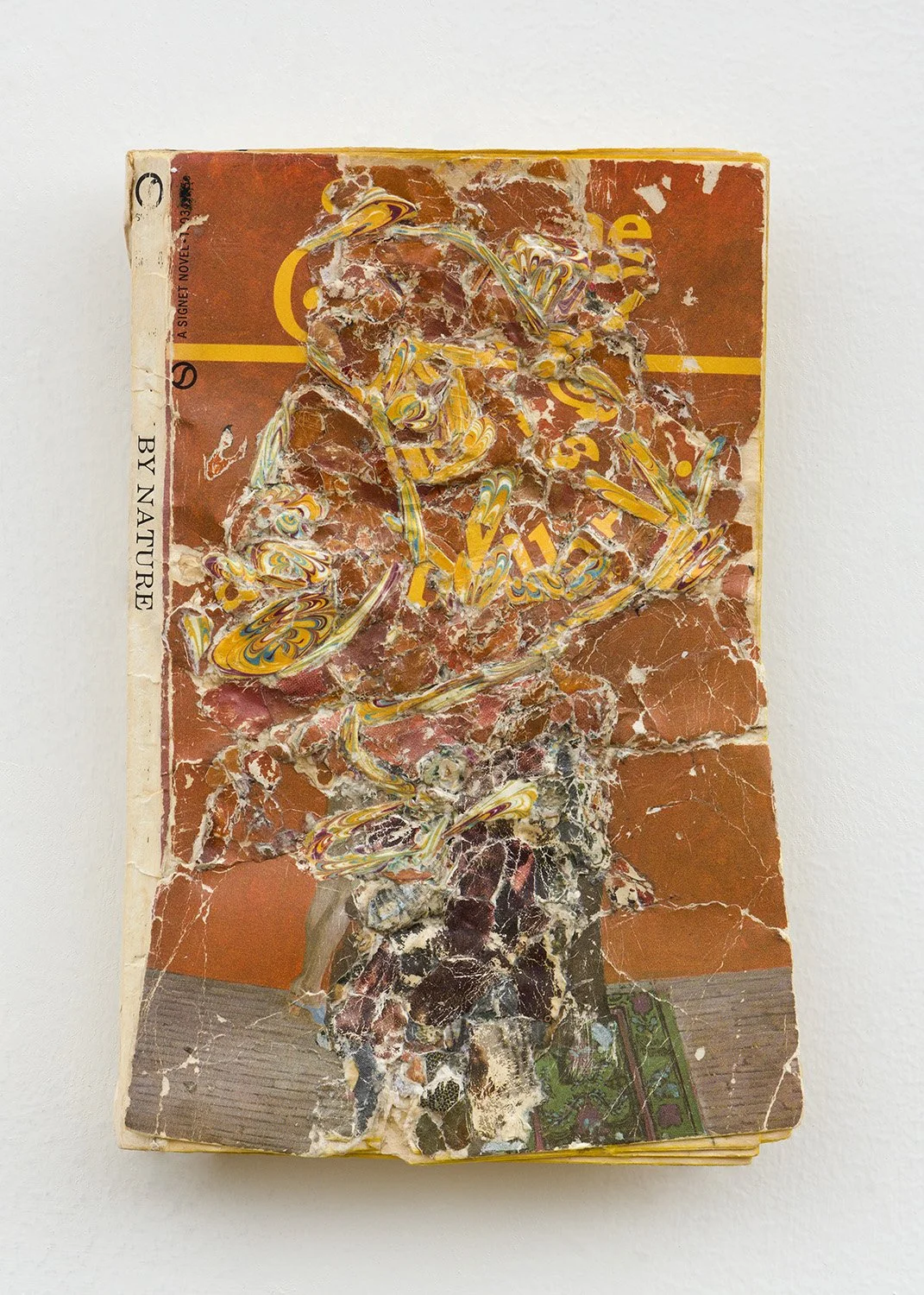 By Nature , 2021, Collage/decollage on paperback book from Portland, OR, 7 x 4.75 x .75”