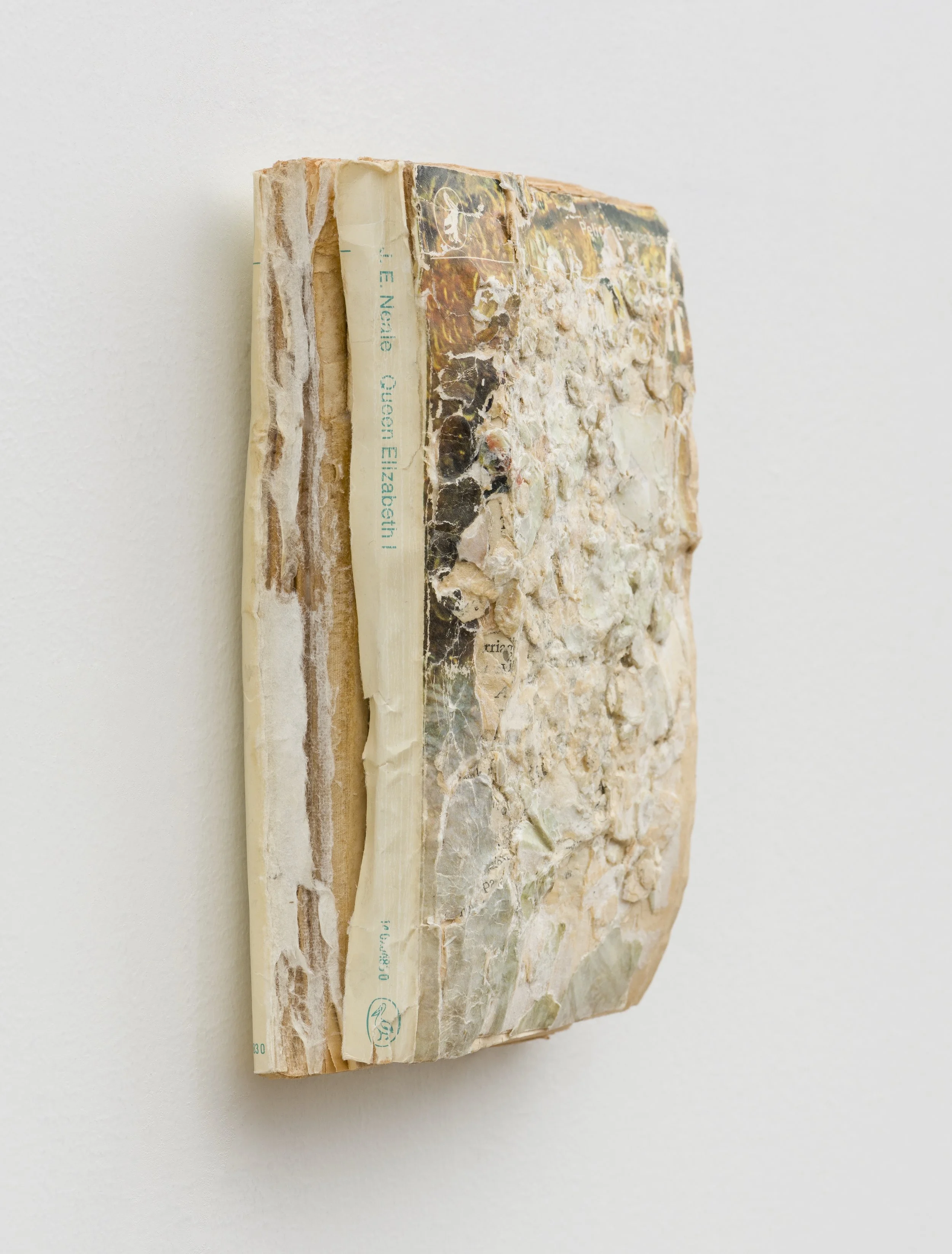 The Queen  (detail), 2024, Collage/decollage on paperback book, 7 x 5 x 1.25"