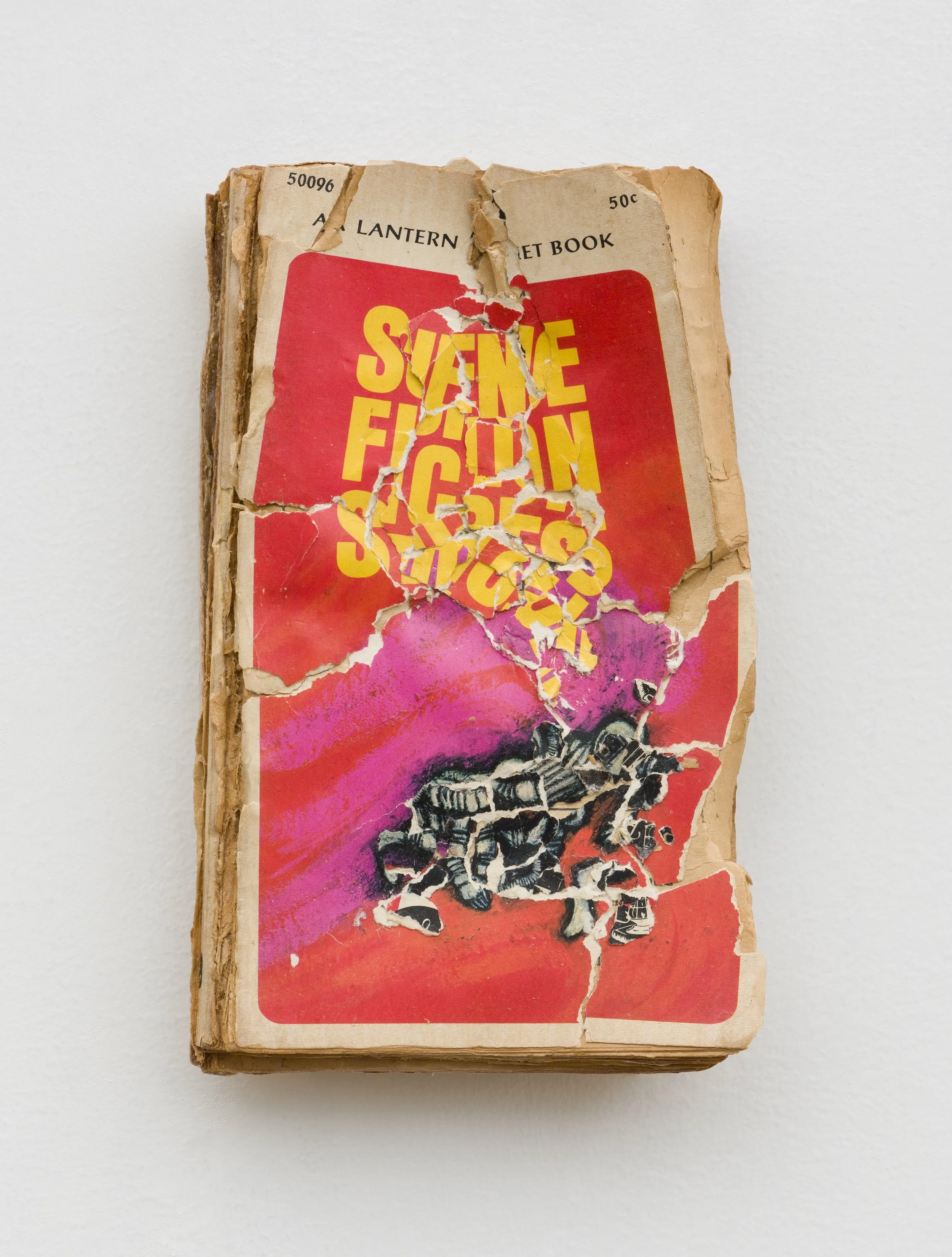 Science Fiction Stories , 2024, Collage/decollage on paperback book, 7.25 x 5 x 1"