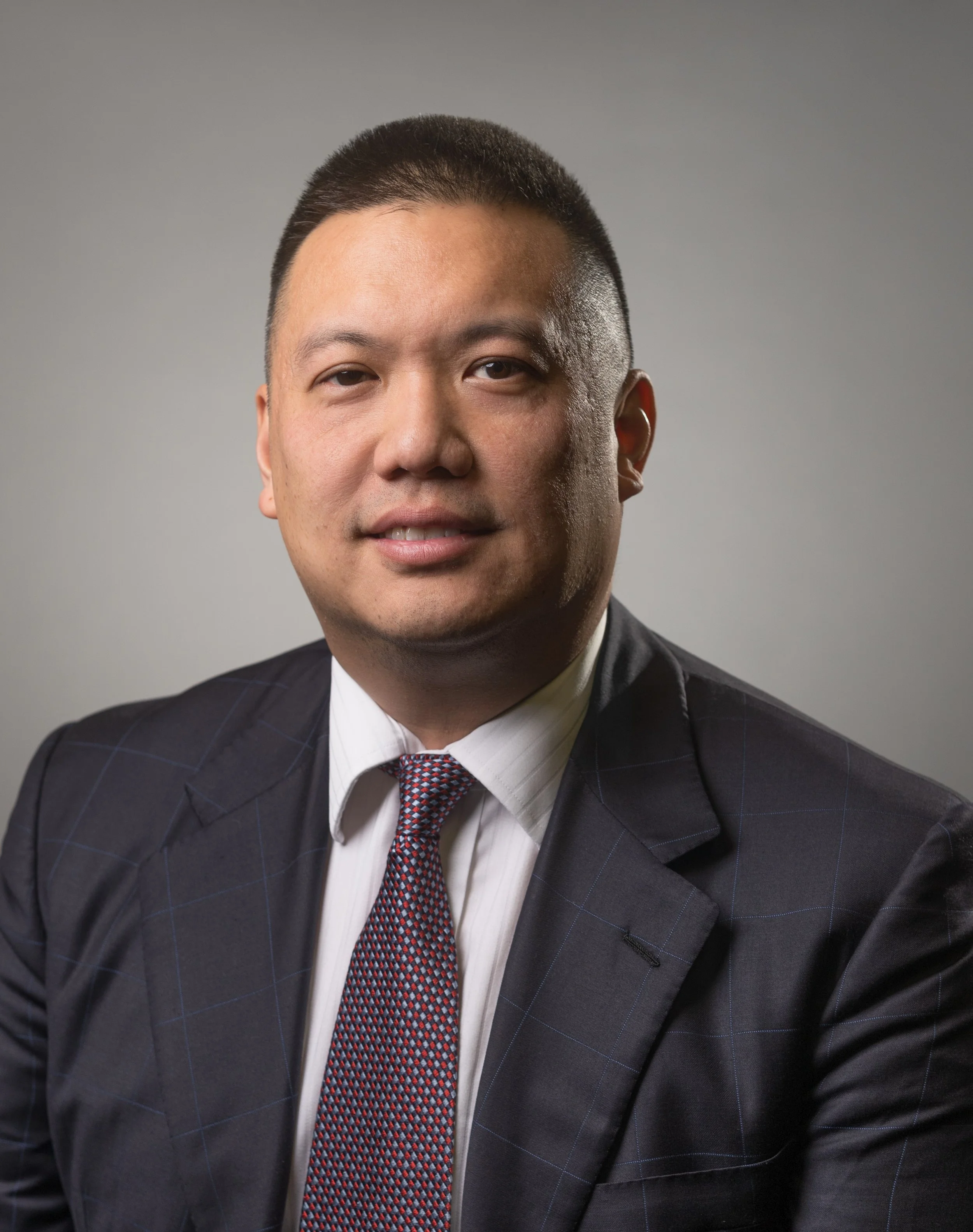 Our Team — AXIUM CAPITAL INC.