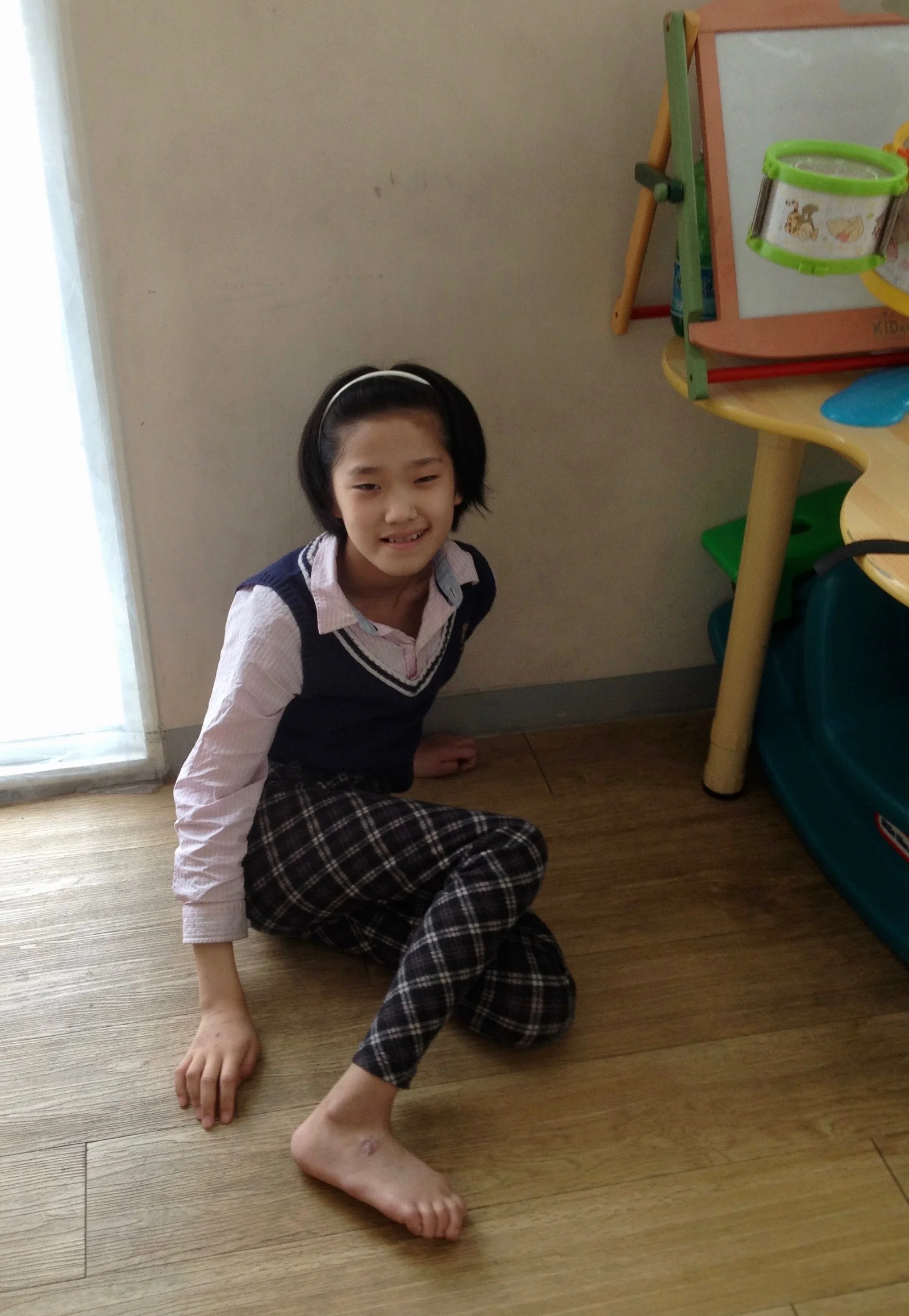 Ten year-old girl treated for cerebral palsy in the Pyongyang Medical School Hospital