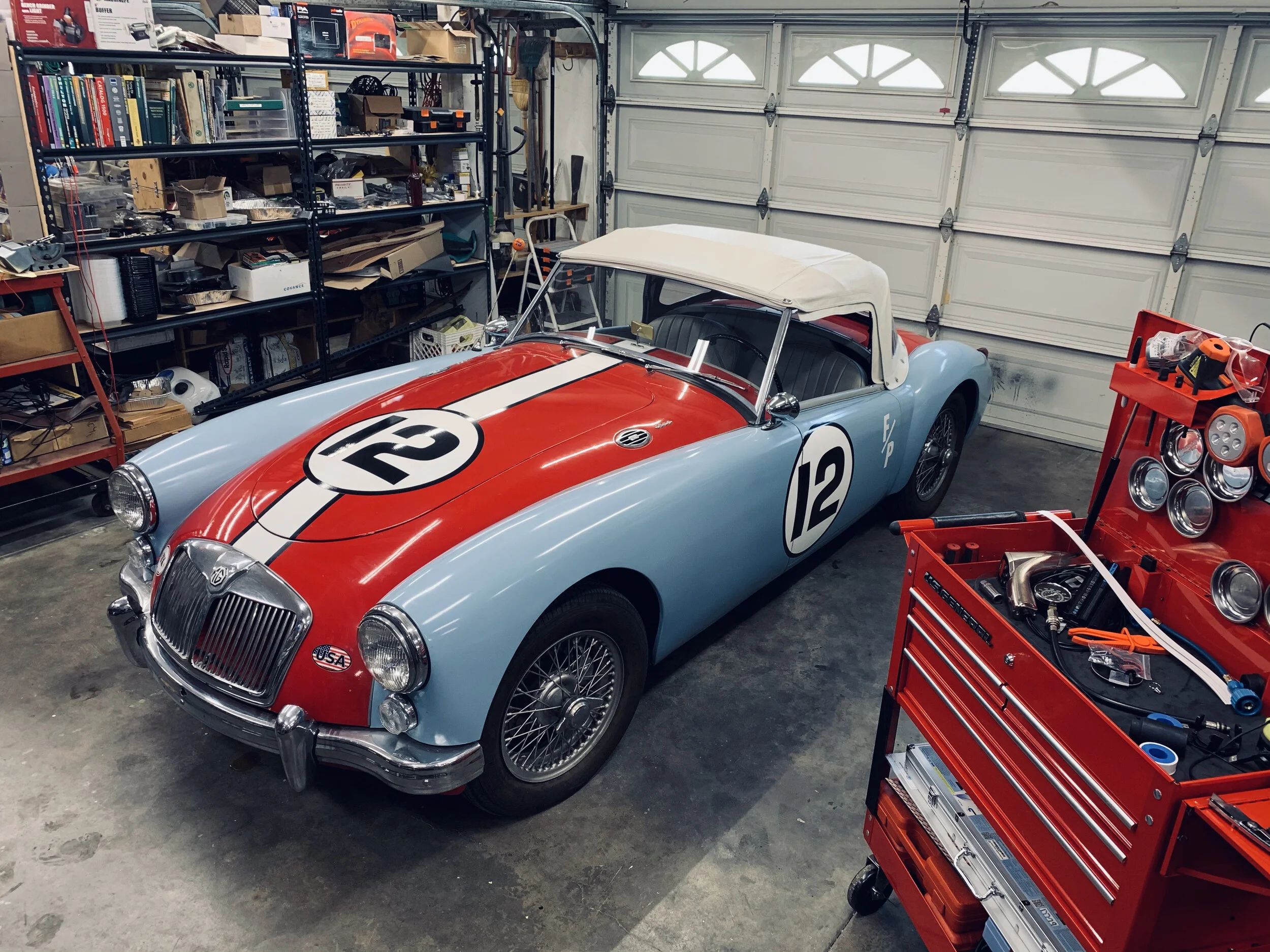 MGA racecar number 12 in garage..jpg
