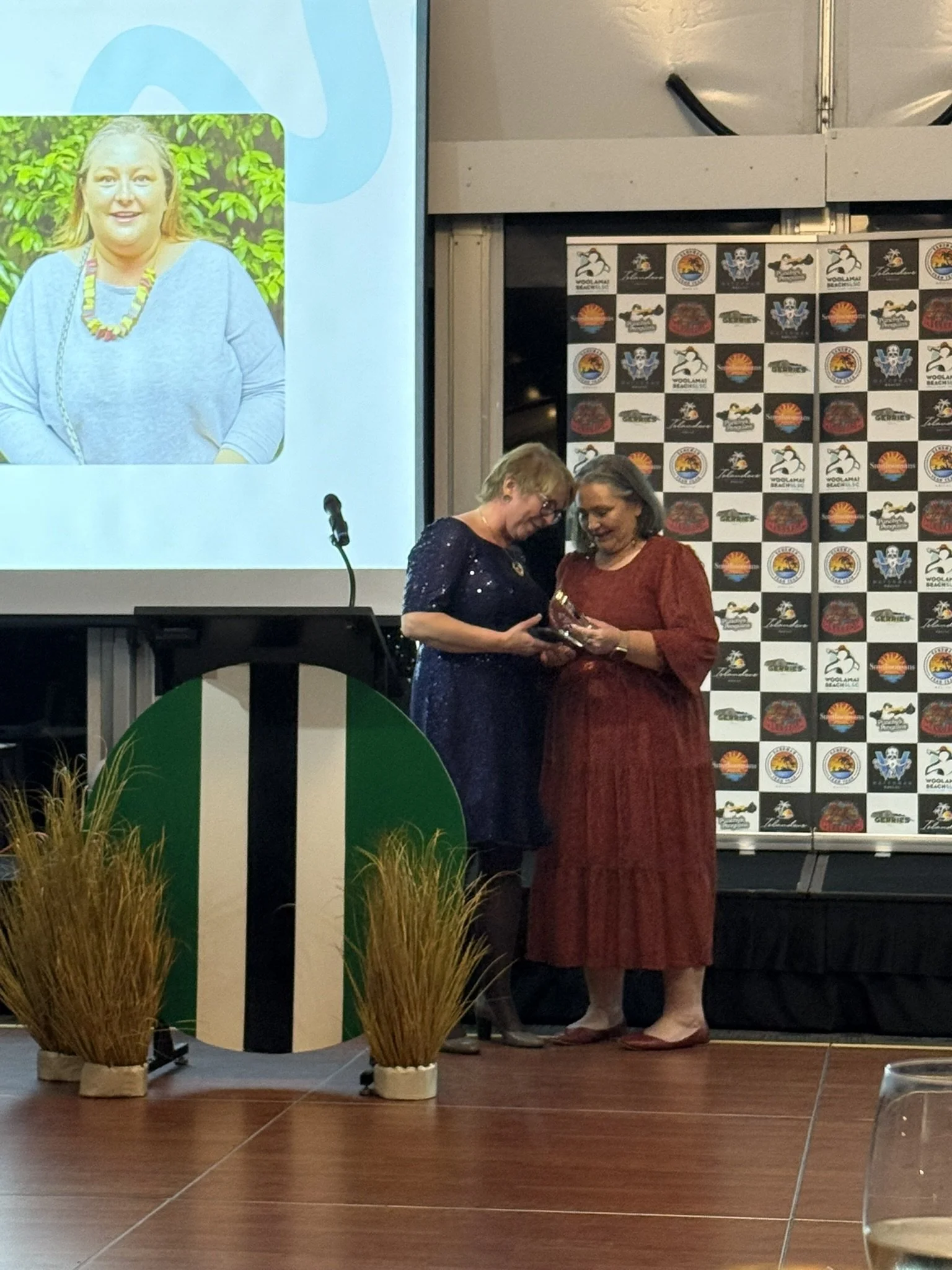 Fi presenting Bre McGrath w award.JPEG