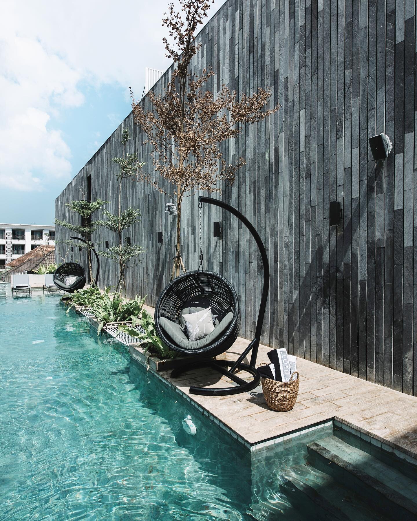 #PoolSeries - Lloyd&rsquo;s Inn Bali: designed with water hammocks and signature cubby chairs, with a jacuzzi corner. #lifestyle #experience