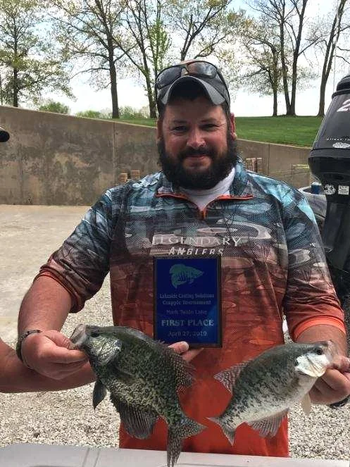 Lakeside Quality Technician CJ Mudd, posing with his team’s fish and first place award