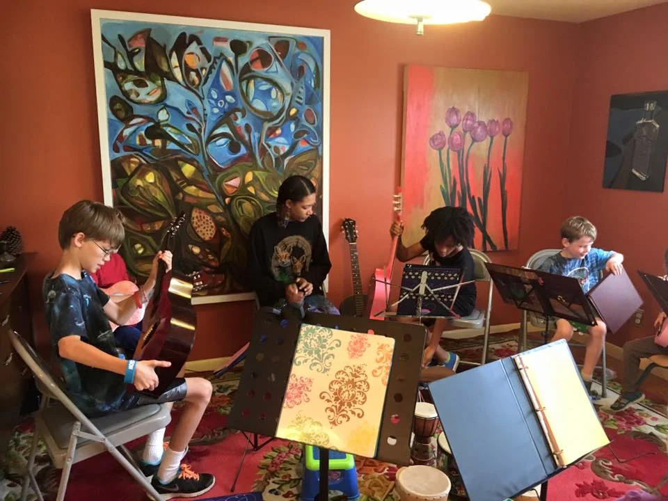 Young student participating in a creative activity at Miss Leticia Music School near Hadley MA