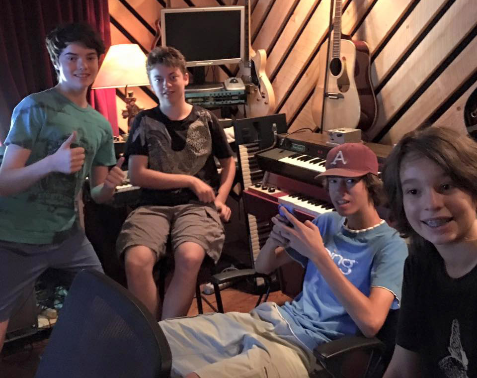 Young musicians learning together in a music studio near Belchertown Massachusetts