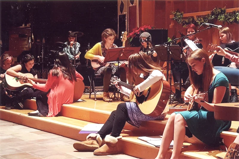Students performing at a music recital near Pelham MA
