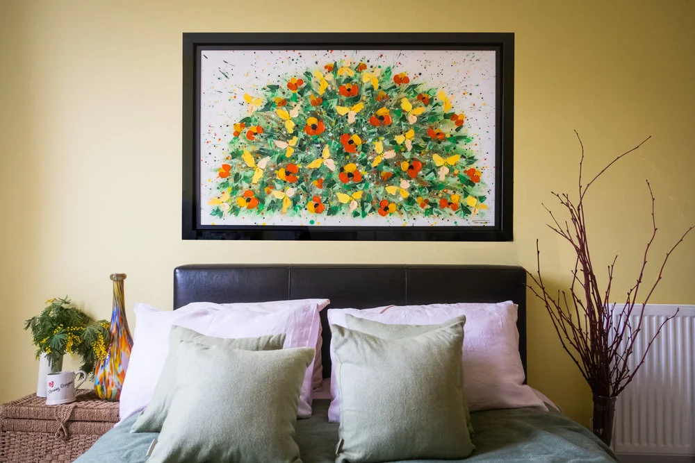 multicoloured glass vase, flowers, mug