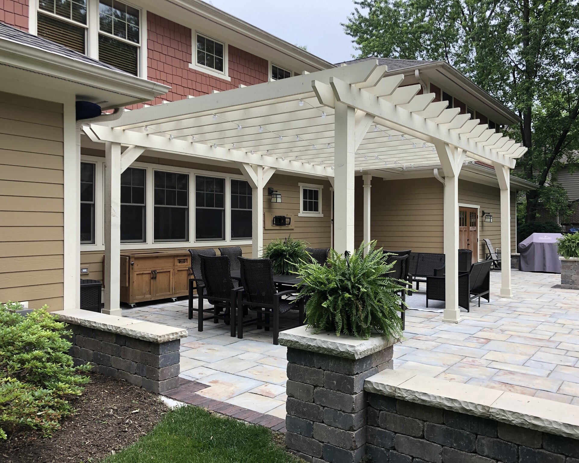 Modern landscape design Frankfort IL with brick patio and pergola