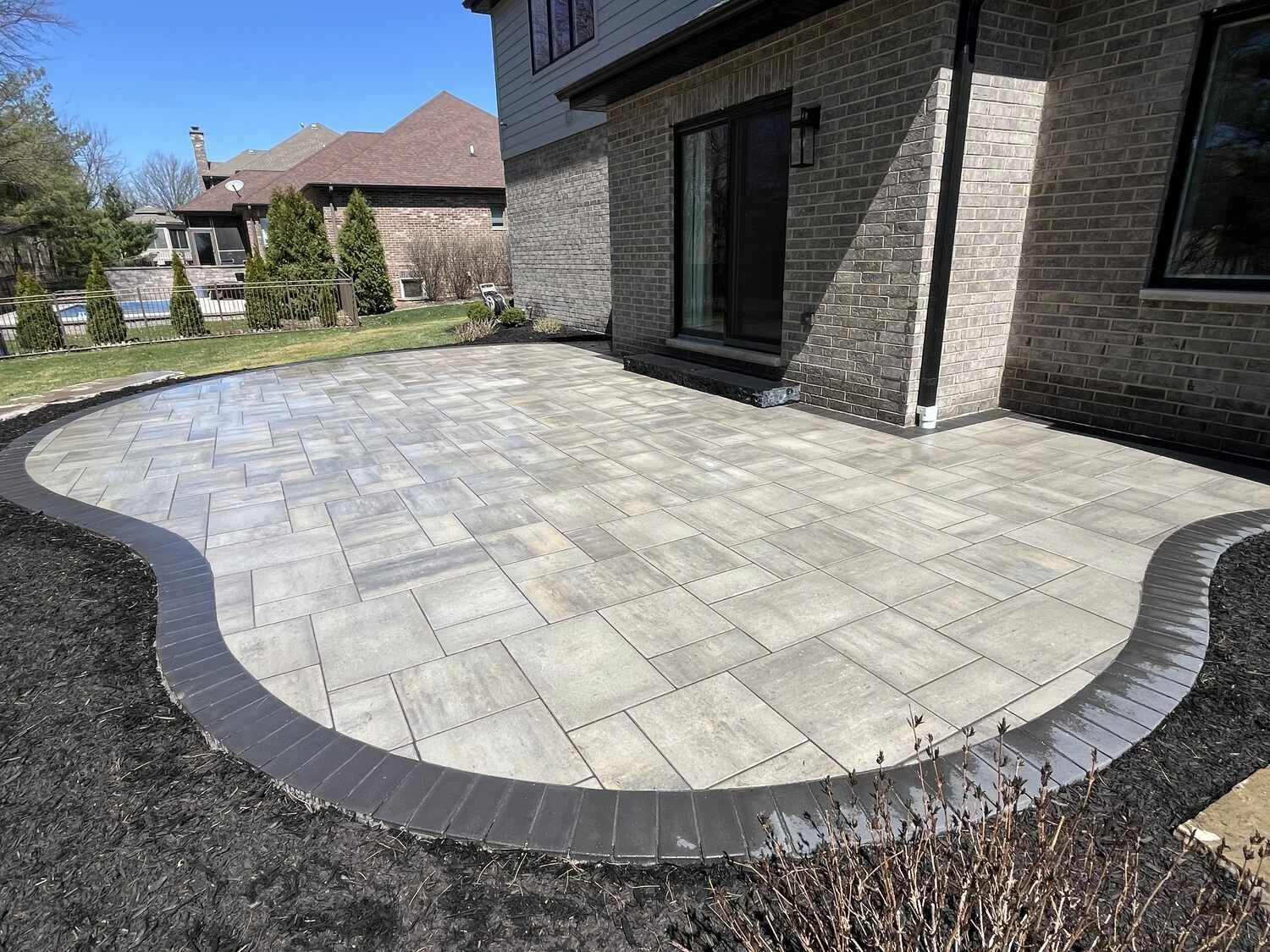 Paver patio with custom stone patterns in Orland Park IL.jpeg