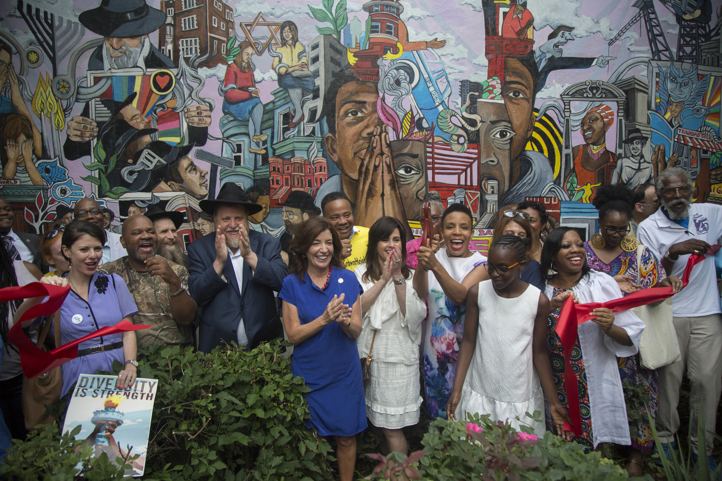 City Council Member Laurie Cumbo Cuts Ribbon On New Community Mural During One Crown Heights Summer Festival