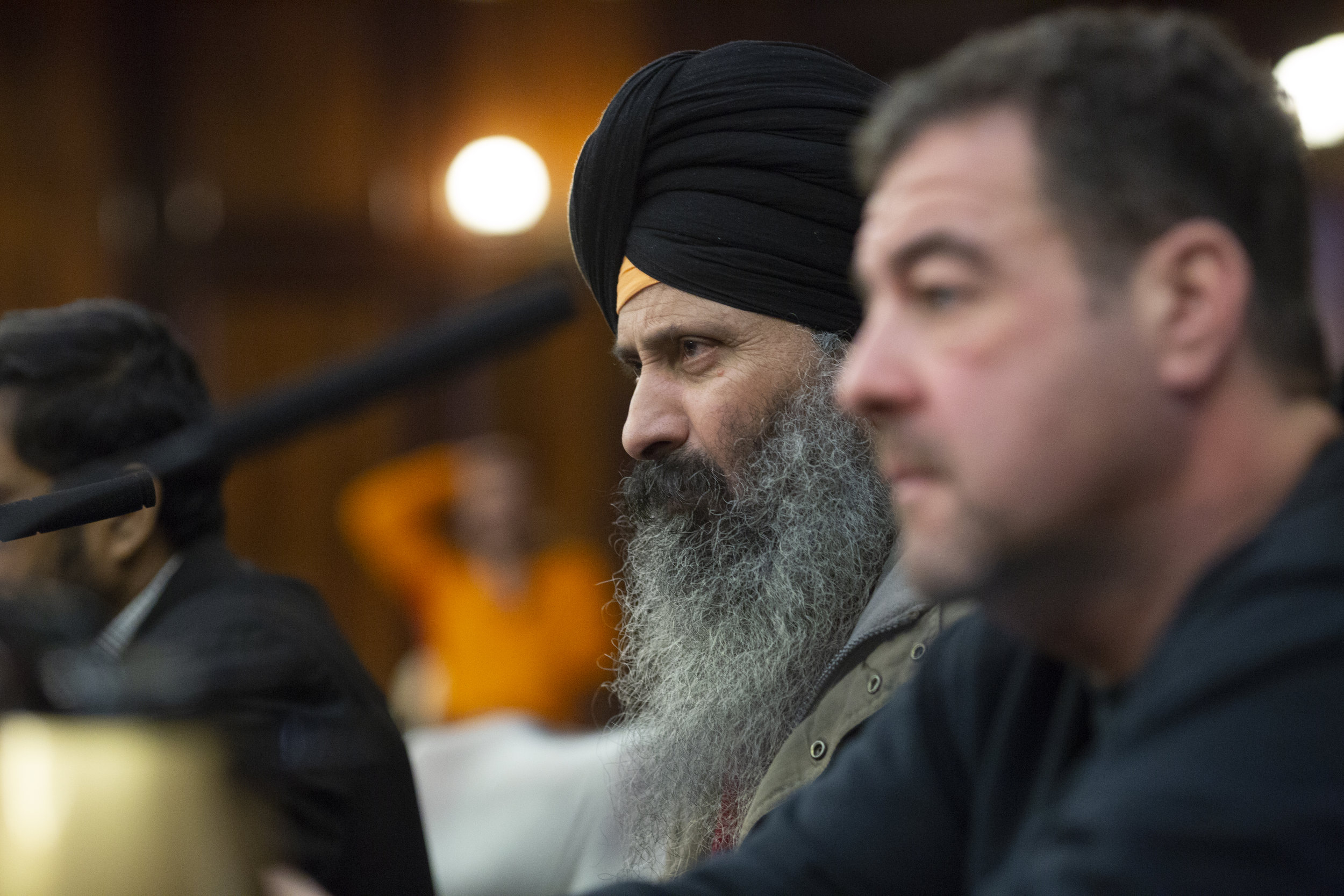 A Taxi Driver Testifies Before The City Council Committee On For Hire Vehicles 