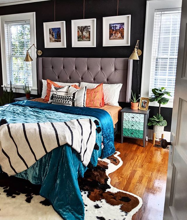 One room down!!! 6 more to go! I will be giving everyone a tour very soon!... Painting this accent wall matte black in our bedroom is one of my favorite design decisions yet! The rest of the room is painted a pale Sea Blue *more pics coming soon*