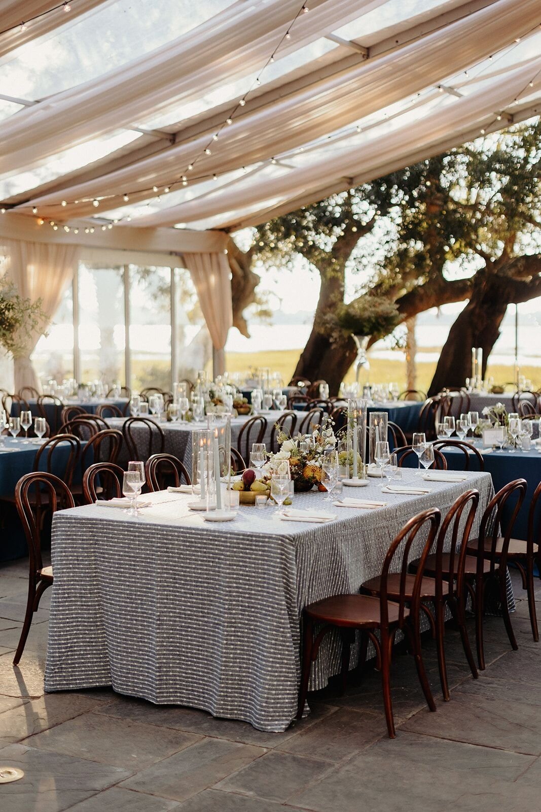 Here comes the sunset... 🌅
.
.
.
#goldenhour #weddingreception #weddingdesign #weddingdecor #wedding #seateddinner #tablescape #bluewedding #nudewedding #champagnewedding #ceilingswag #ceilingtreatment #cleartoptent #champagnefabric #nudefabric #neu