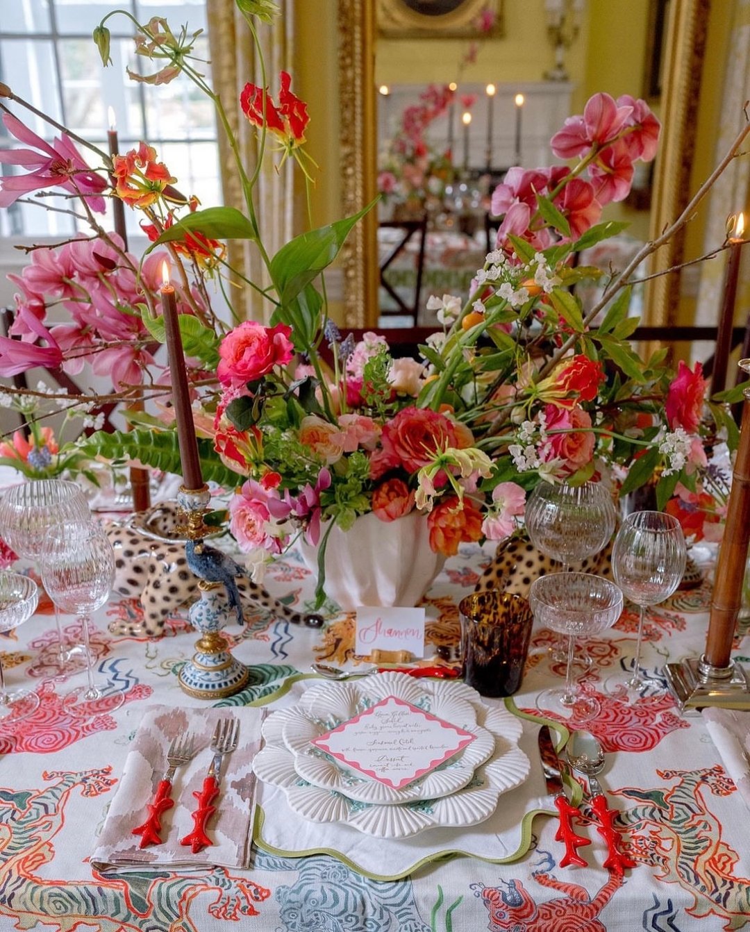 If this doesn't radiate a palette of happiness, we don't know what does! 💚 🐆 🌸 🪸 🌈 🌿 💗
.
.
.
#colorful #radiate #happiness #tablescape #styledshoot #customtablecloth #junglevibes #jungalow #pinkfloral #placesetting #photoshoot #styled #bolddes