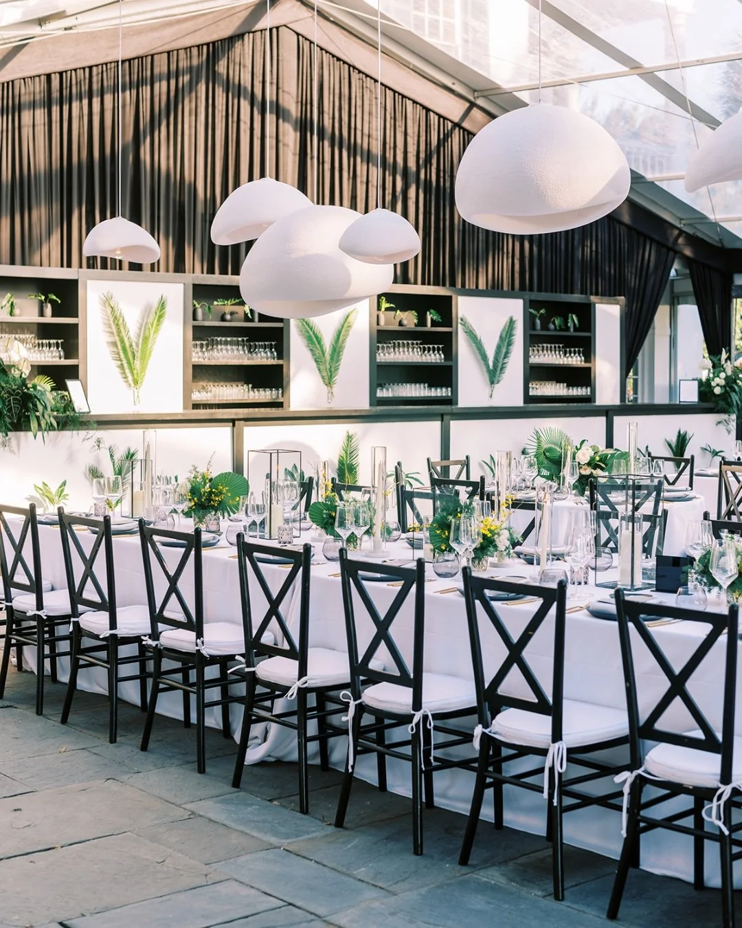 The Art of Transformation 🖤. Dramatic black draping and tropical greens gave this clear top tent a whole new personality. And then came the moment they saw it for the first time&hellip; that reaction? Thats why we do what we do! 
.
.
.
#thesocialspo