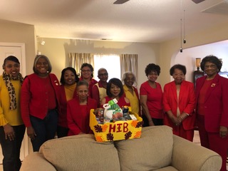 Alpha Theta prepares a Thanksgiving box for the Westglen Group Home, November 2018.
