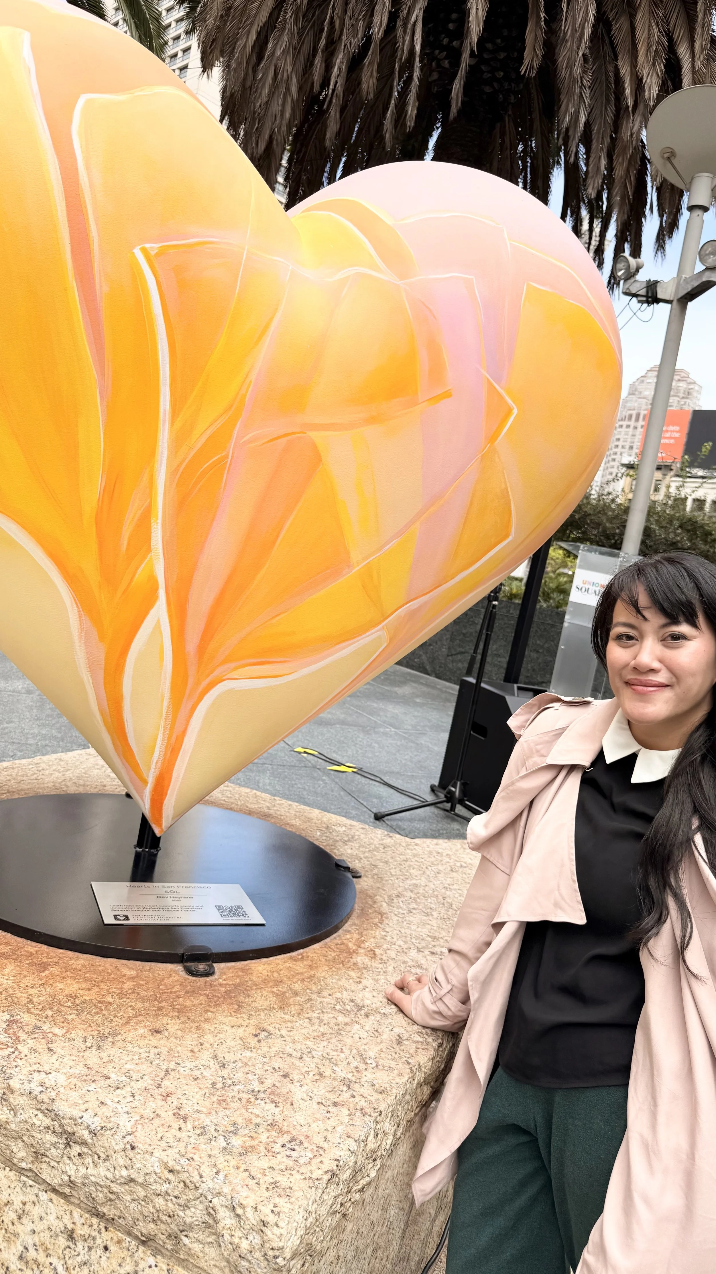 Dev Heyrana at the public unveiling of her SŌL heart sculpture in Union Square at Powell and Geary, San Francisco