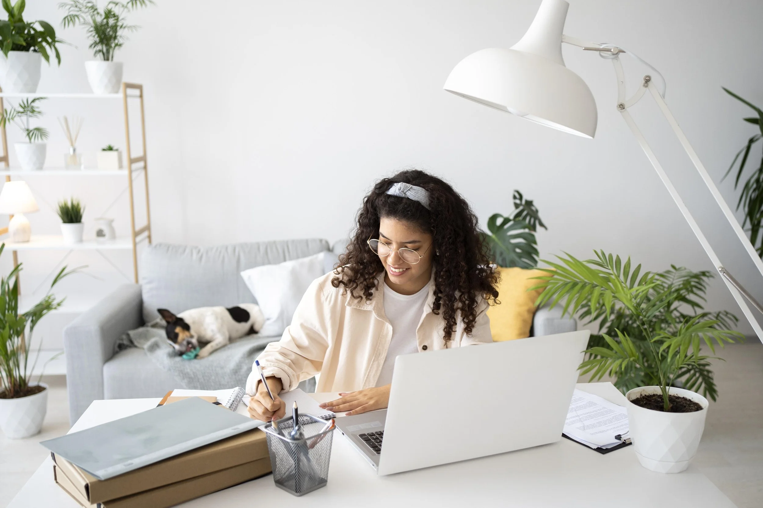 medium-shot-woman-working-desk-with-laptop.jpg