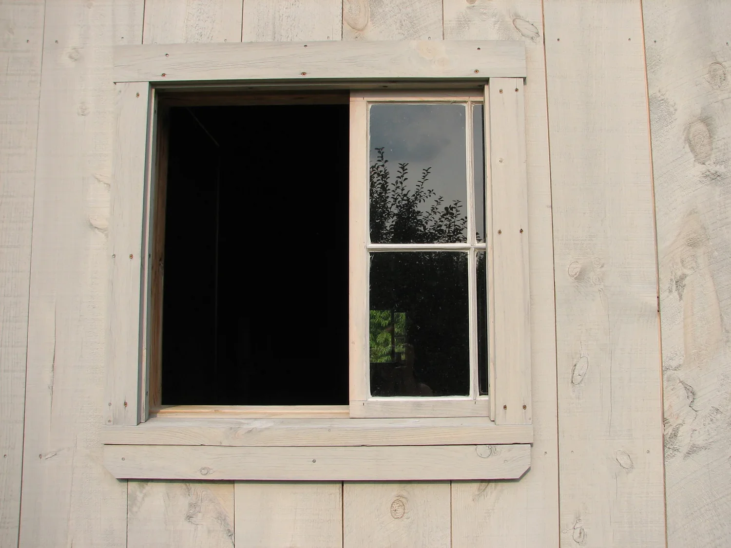 Sliding+Window+-+partially+open+from+exterior.webp