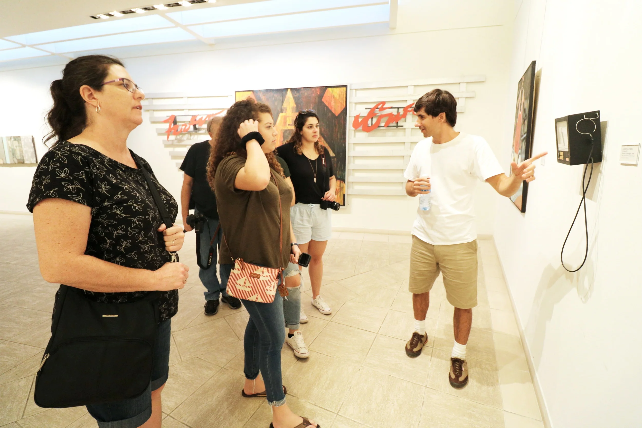 Onel explaining a Cuban art piece