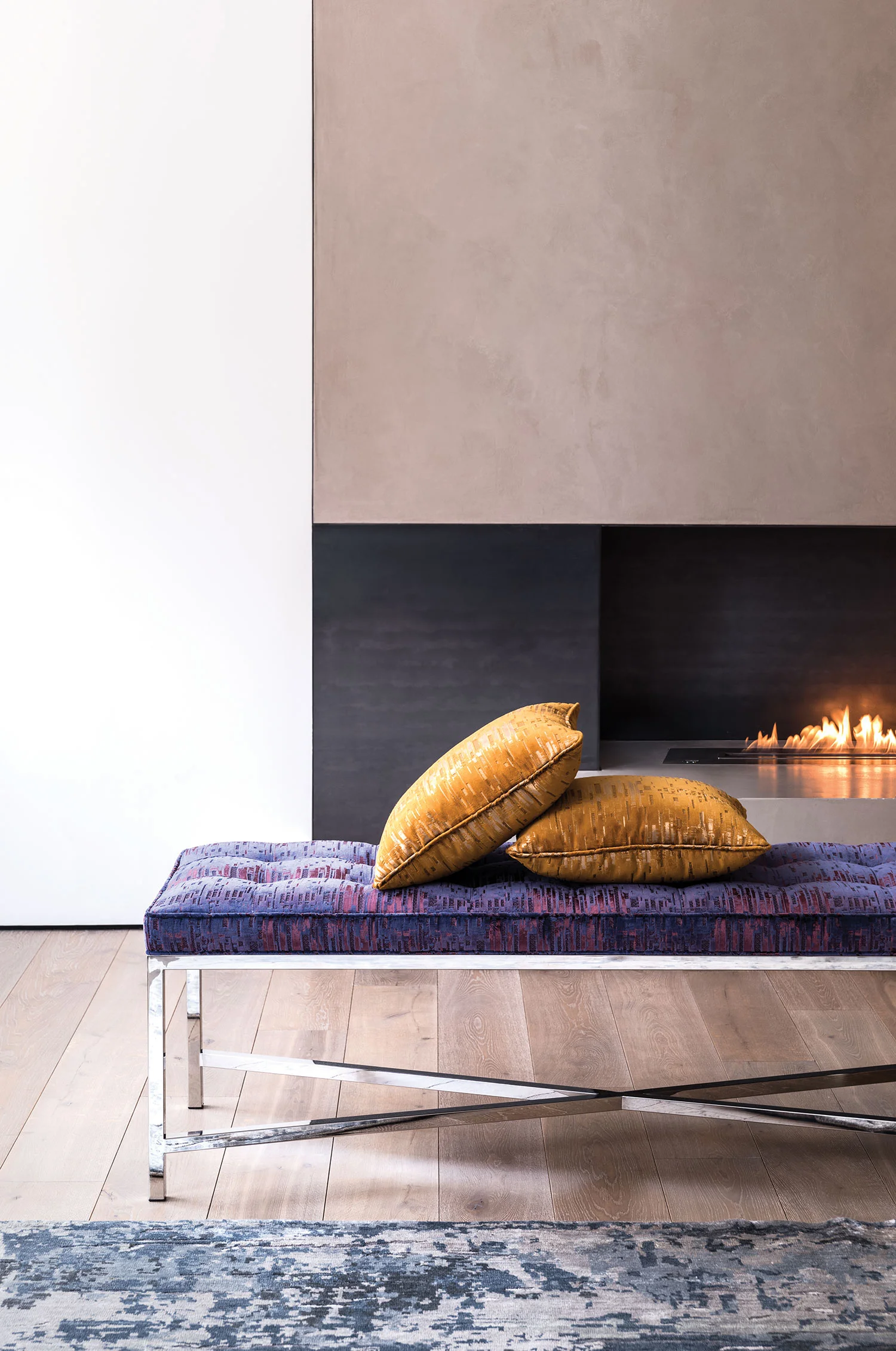 quest_hospitality_pillow_bench_fireplace.jpg