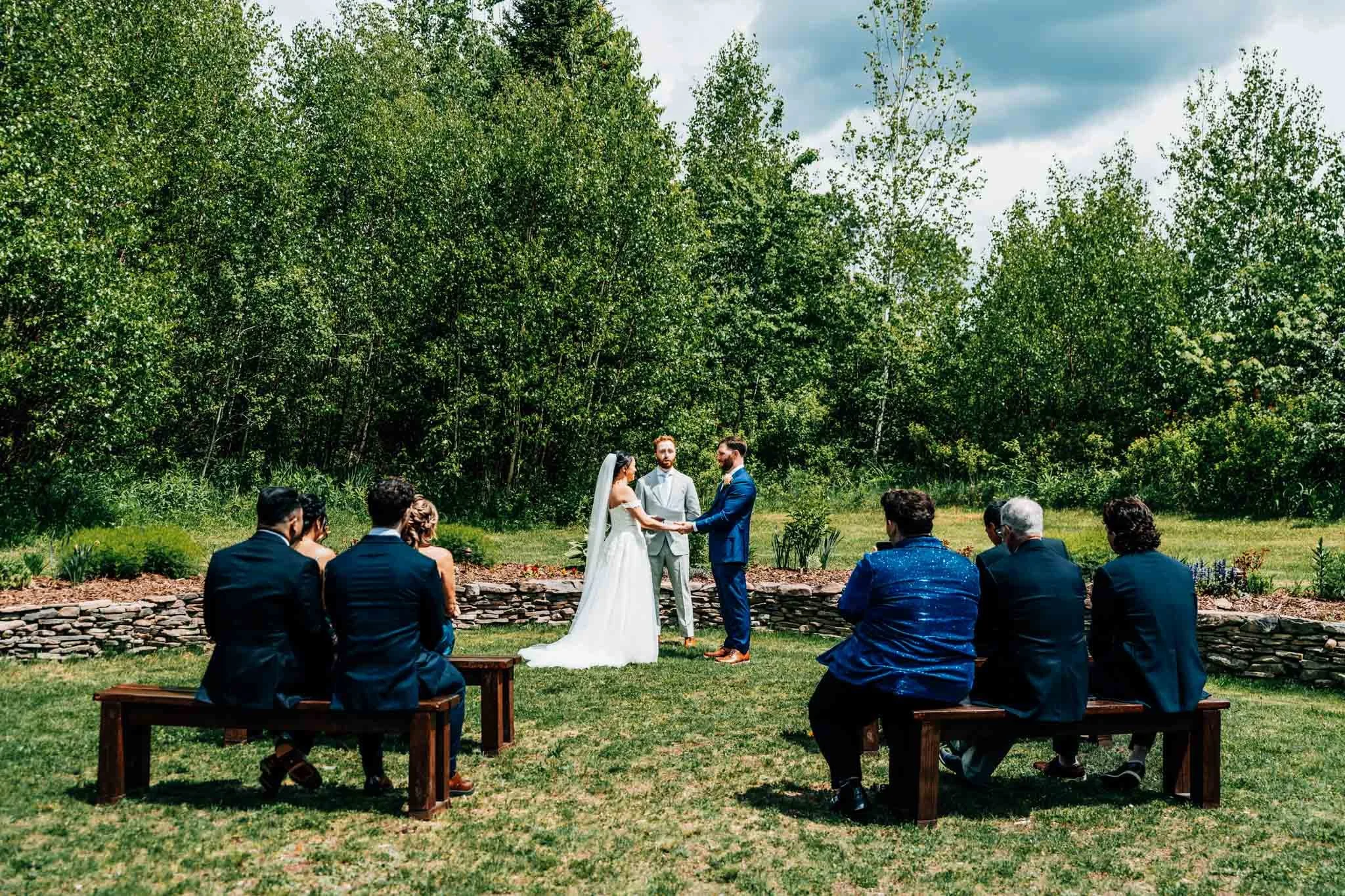 Couple eloping with a few guests at their airbnb
