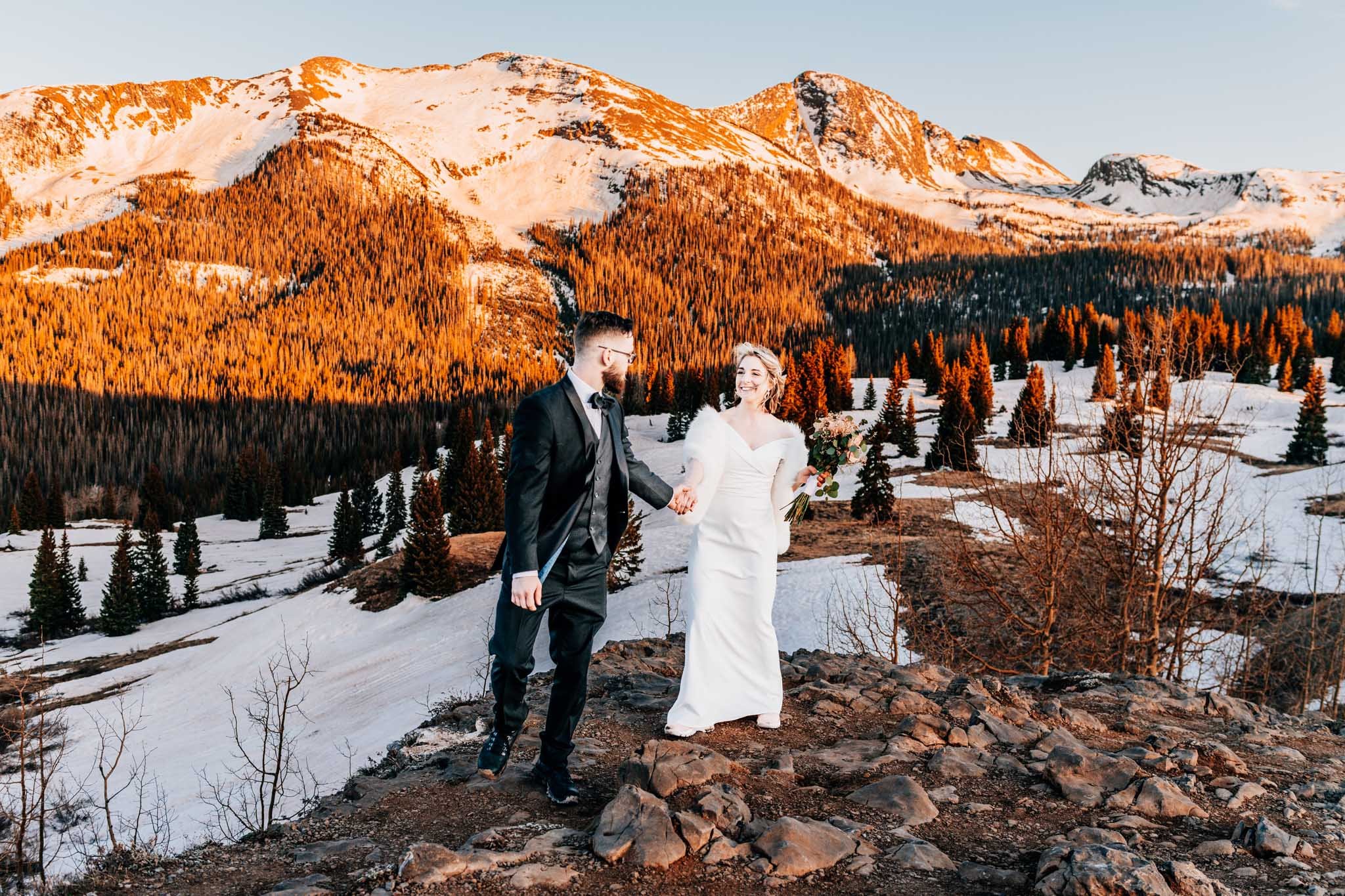 Couple eloping at sunset in the san juan mountains