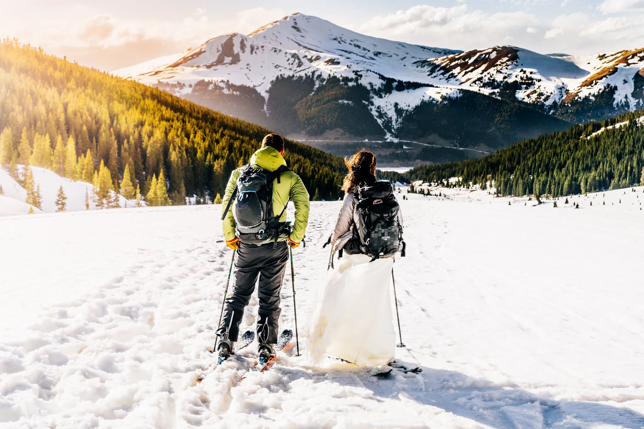 Couple getting married on skis in summit county in colorado