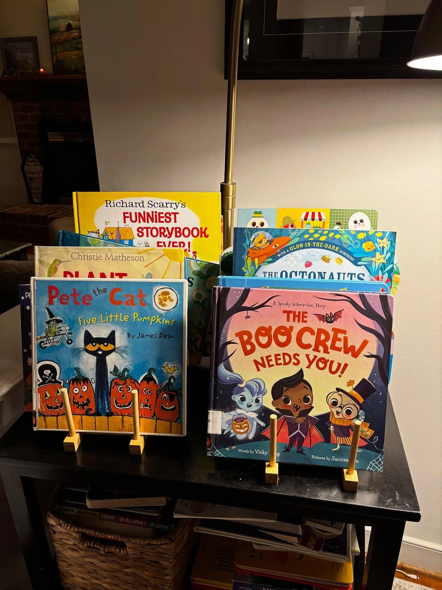 Put your books on display with one of these maple racks from @thecontainerstore and your kids are sure to grab a book and read! Stole this photo from a friend&rsquo;s house at mahjong this week. :-)