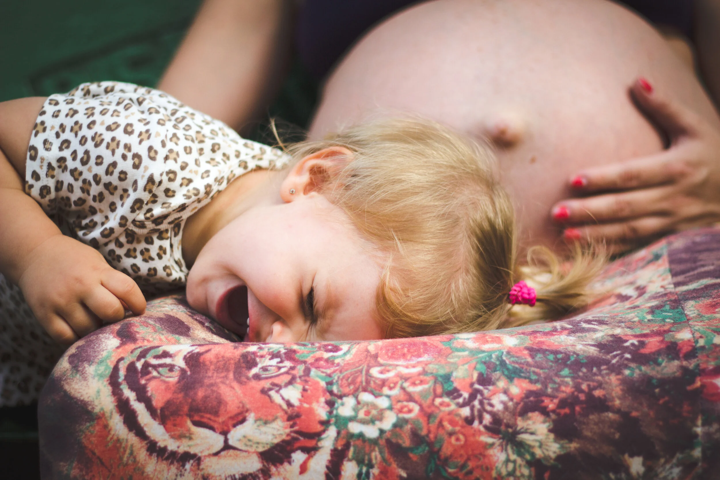 Canva - Girl Crying on Woman's Lap.jpg