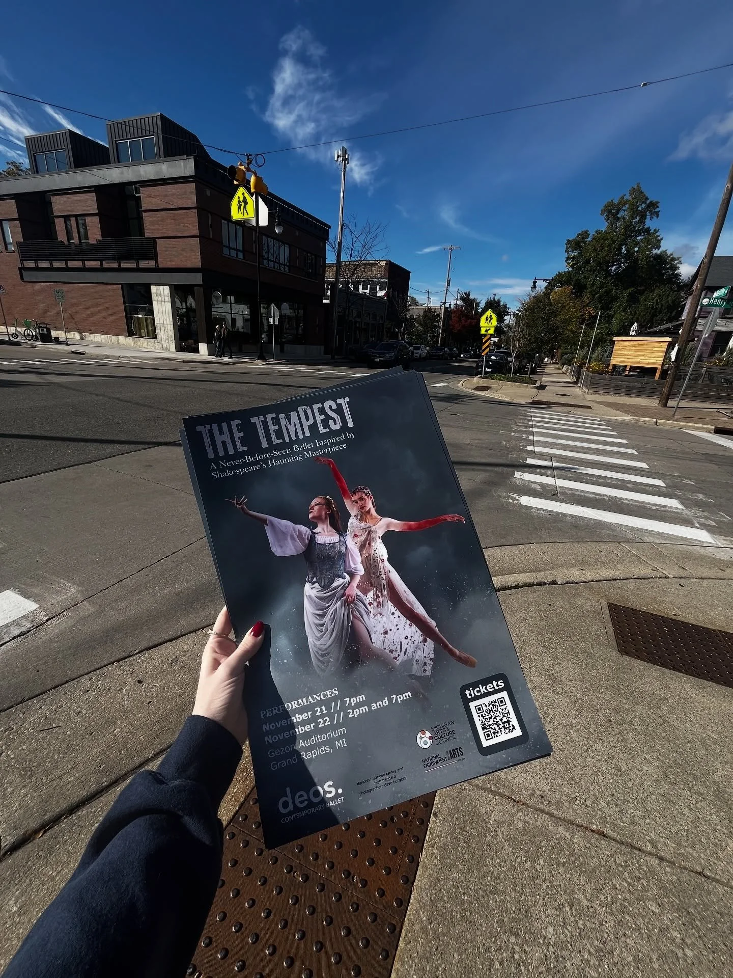 It’s a beautiful day to hang posters and connect with the Grand Rapids community!
You may have spotted a poster or two around the town… our dancers and volunteers have been engaging with local small business owners to hang them for all