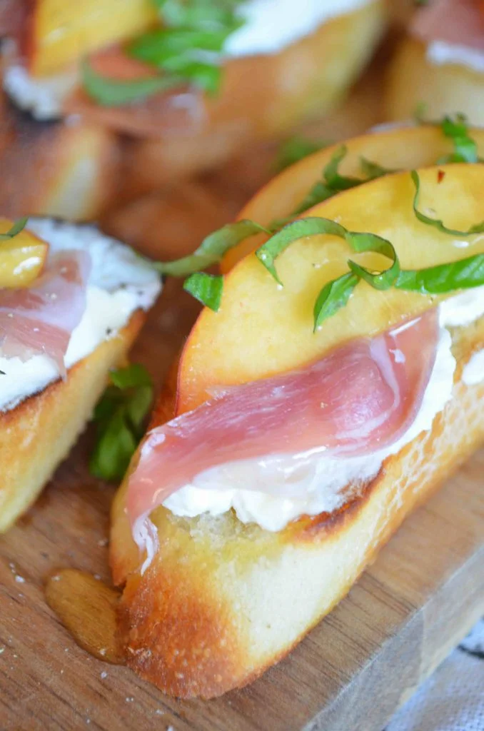 Crostini with Peaches, Ricotta, Prosciutto, Honey and Basil