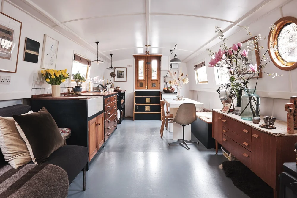 Here it is again from another angle. Even the flower arrangement is a houseboat I want to live on.